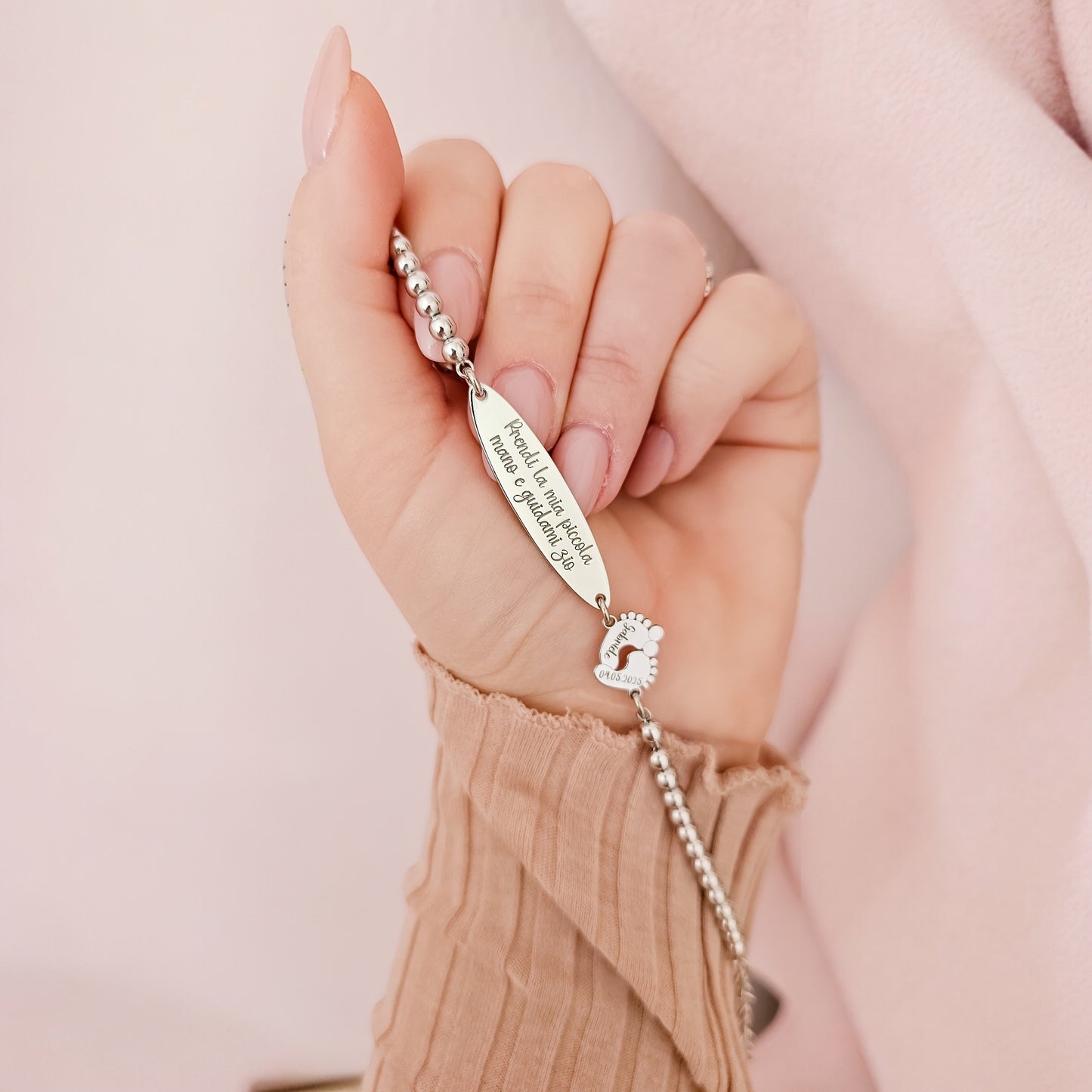 Bracciale sfere piastra ovale e piedini